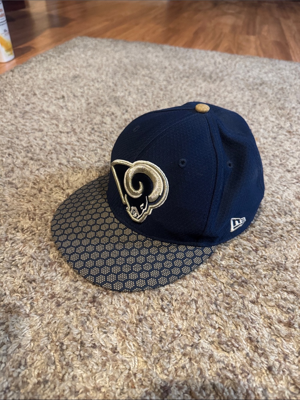 New Era Navy and Gold Los Angeles Rams Fitted Hat with Patterned Brim